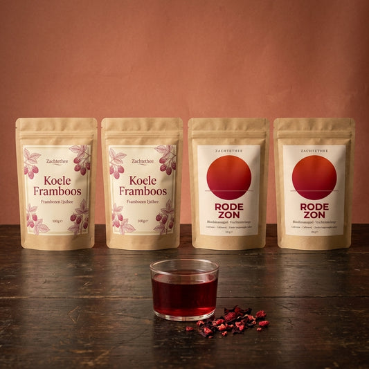 Rode Framboos Pakket: twee zakjes Koele Framboos en twee zakjes Rode Zon met een glas robijnrode cold brew